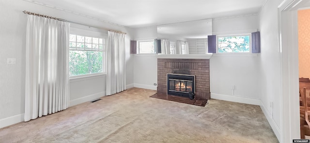 335 E 11th St, Casper, WY 82601 - unfurnished living room featuring a fireplace, healthy amount of natural light, and carpet flooring