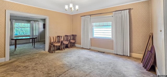 335 E 11th St, Casper, WY 82601 - sitting room with ornamental molding, a chandelier, carpet flooring, and wallpapered walls
