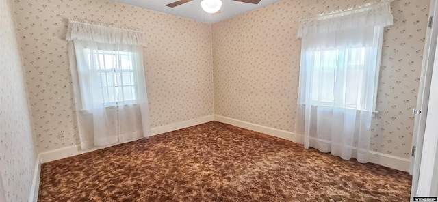 335 E 11th St, Casper, WY 82601 - carpeted empty room featuring a ceiling fan and wallpapered walls