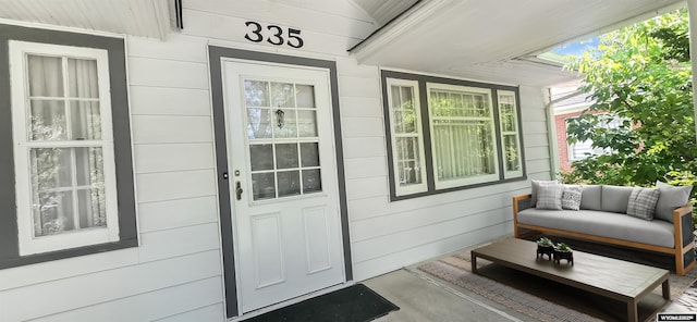 335 E 11th St, Casper, WY 82601 - doorway to property with covered porch and outdoor lounge area