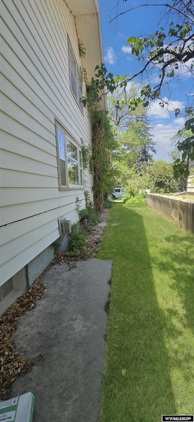335 E 11th St, Casper, WY 82601 - view of grassy yard featuring a patio
