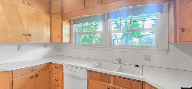 335 E 11th St, Casper, WY 82601 - kitchen featuring white dishwasher and light countertops