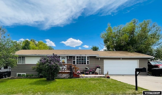 1328 Canyon Ct, Kemmerer, WY 83101 - single story home featuring concrete driveway, a garage, and a front yard
