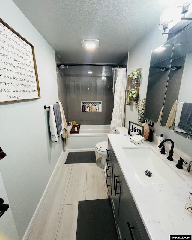 1328 Canyon Ct, Kemmerer, WY 83101 - full bath featuring vanity, a textured ceiling, shower / bath combination with curtain, and wood finished floors
