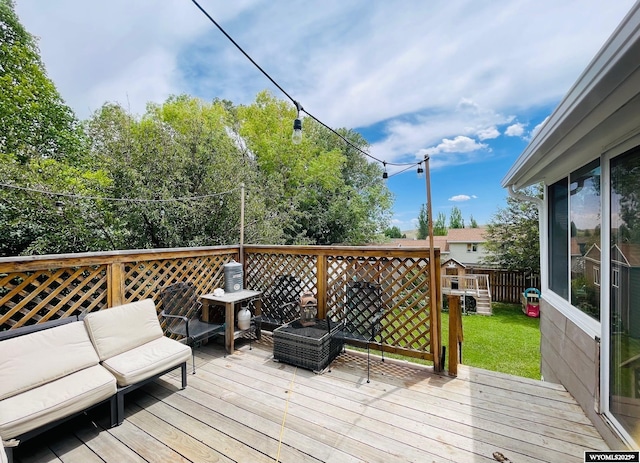 1328 Canyon Ct, Kemmerer, WY 83101 - wooden deck with outdoor lounge area and a yard