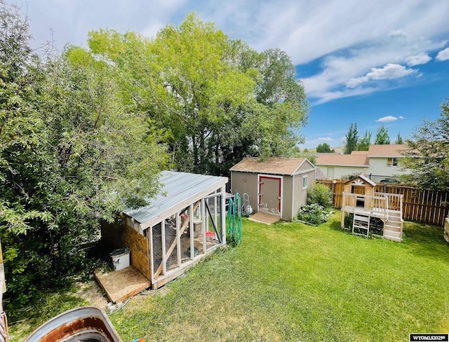 1328 Canyon Ct, Kemmerer, WY 83101 - view of yard featuring exterior structure and a storage unit
