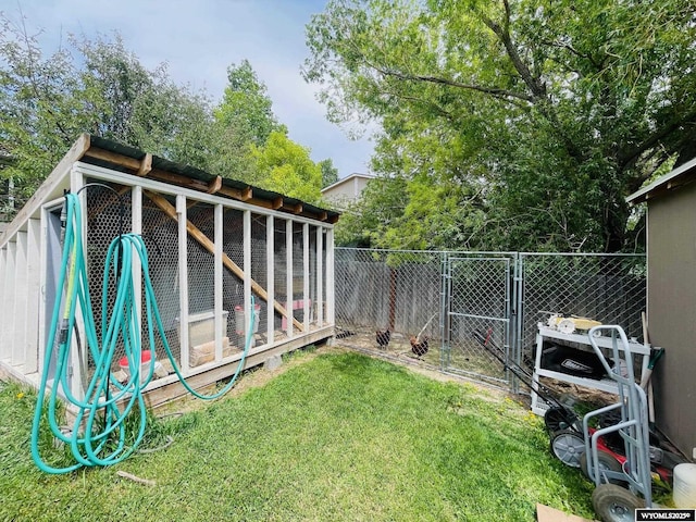 1328 Canyon Ct, Kemmerer, WY 83101 - fenced backyard with exterior structure and an outdoor structure