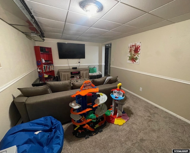 1328 Canyon Ct, Kemmerer, WY 83101 - living room featuring a paneled ceiling and carpet flooring