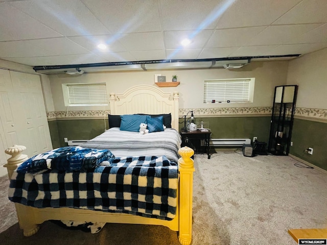 1328 Canyon Ct, Kemmerer, WY 83101 - bedroom featuring carpet floors, a drop ceiling, and baseboard heating