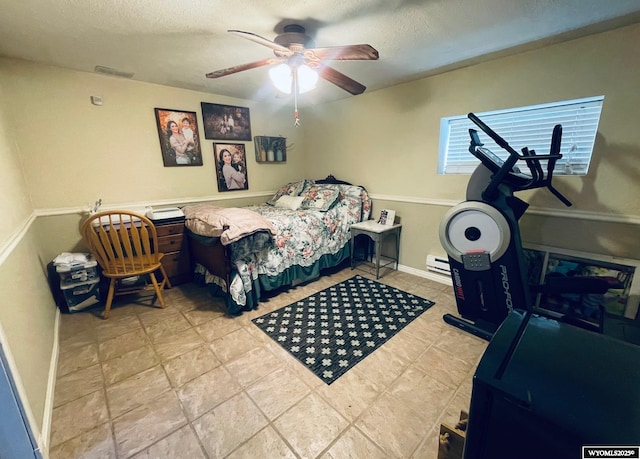 1328 Canyon Ct, Kemmerer, WY 83101 - bedroom featuring a textured ceiling and ceiling fan
