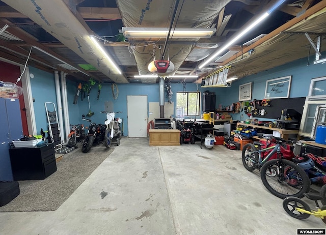 1328 Canyon Ct, Kemmerer, WY 83101 - garage with a workshop area and a garage door opener