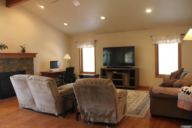 1540 Manor Dr, Casper, WY 82609 - living area with a stone fireplace, recessed lighting, wood finished floors, and a ceiling fan