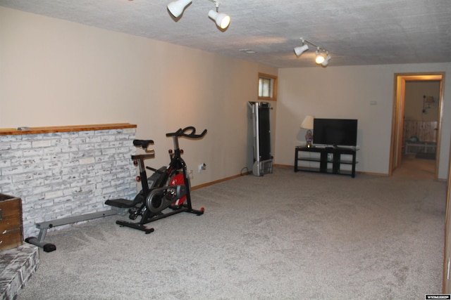 1540 Manor Dr, Casper, WY 82609 - workout area with carpet floors and rail lighting