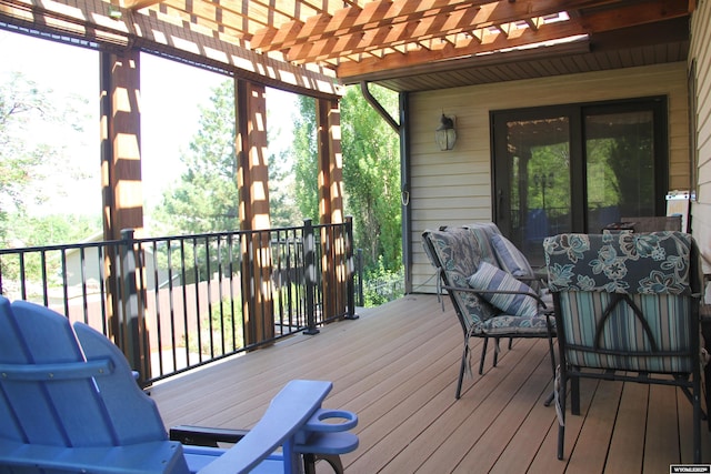 1540 Manor Dr, Casper, WY 82609 - wooden deck with a pergola