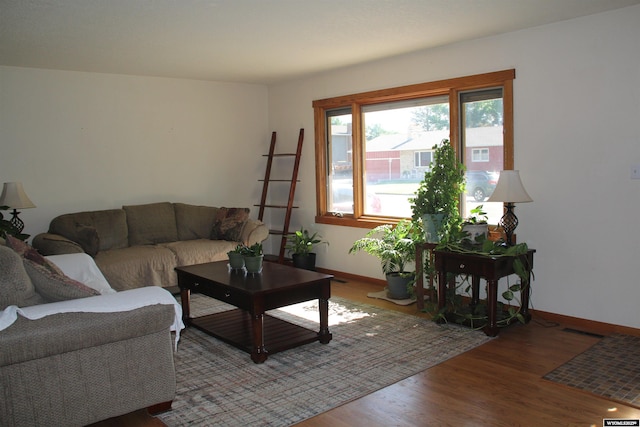 1540 Manor Dr, Casper, WY 82609 - living room featuring wood finished floors and baseboards