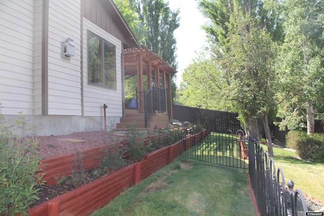 1540 Manor Dr, Casper, WY 82609 - fenced backyard with a pergola
