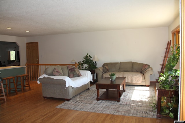 1540 Manor Dr, Casper, WY 82609 - living room featuring wood finished floors, recessed lighting, and a textured ceiling