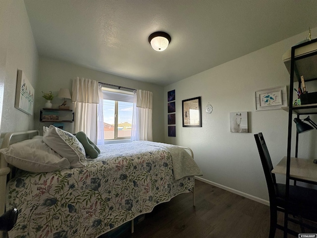 1261 Meadow Ln, Douglas, WY 82633 - bedroom featuring wood finished floors and baseboards