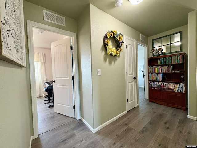 1261 Meadow Ln, Douglas, WY 82633 - hallway with wood finished floors