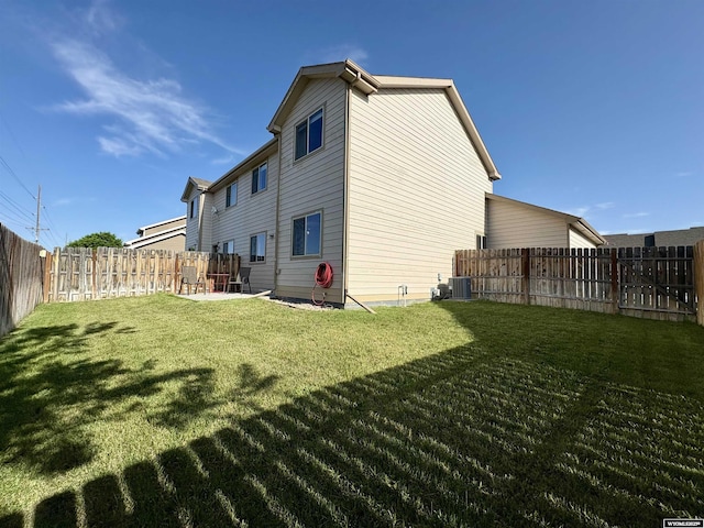1261 Meadow Ln, Douglas, WY 82633 - rear view of house featuring a fenced backyard and a patio area
