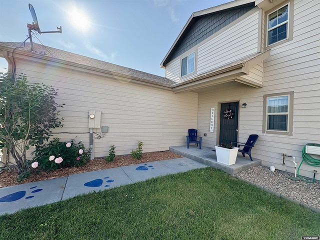 1261 Meadow Ln, Douglas, WY 82633 - view of exterior entry with a yard