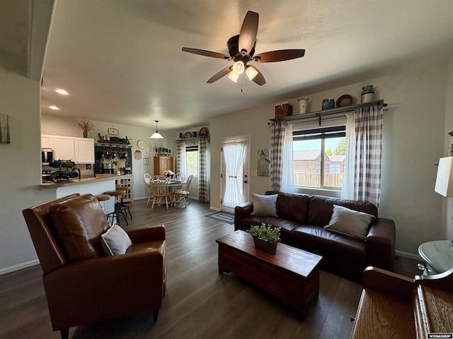 1261 Meadow Ln, Douglas, WY 82633 - living room with ceiling fan, dark wood-style flooring, and recessed lighting