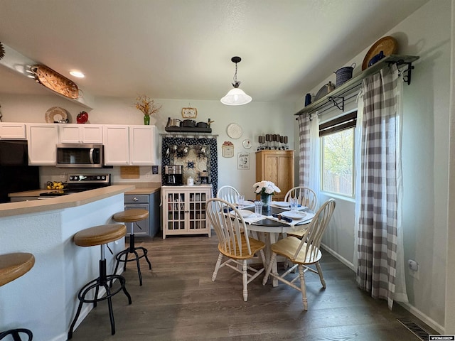 1261 Meadow Ln, Douglas, WY 82633 - dining space featuring dark wood-type flooring