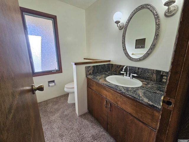 918 E 27th Ave, Torrington, WY 82240 - bathroom featuring vanity and toilet