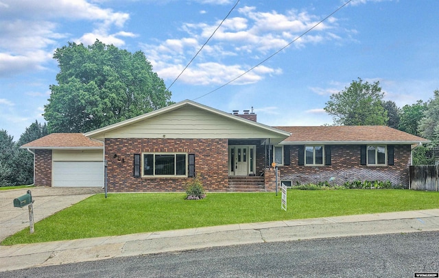 918 E 27th Ave, Torrington, WY 82240 - ranch-style house with brick siding, a garage, and driveway