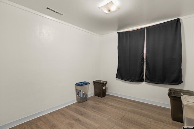 1831 Glendale Ave, Casper, WY 82601 - spare room with wood finished floors and baseboards