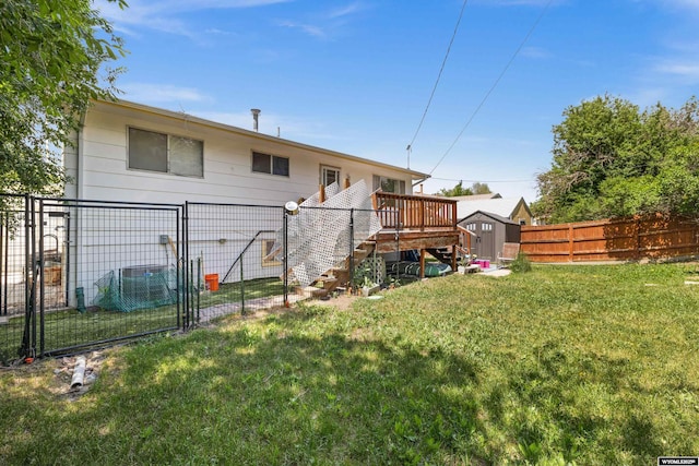 1831 Glendale Ave, Casper, WY 82601 - rear view of property with a storage unit, stairway, a fenced backyard, a gate, and a deck