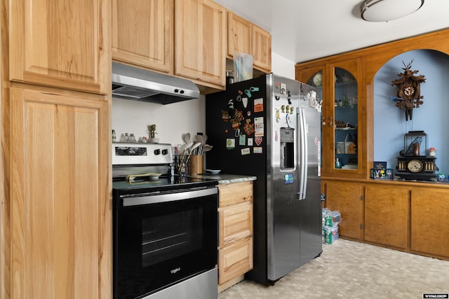 1831 Glendale Ave, Casper, WY 82601 - kitchen with under cabinet range hood, stainless steel appliances, and light brown cabinets