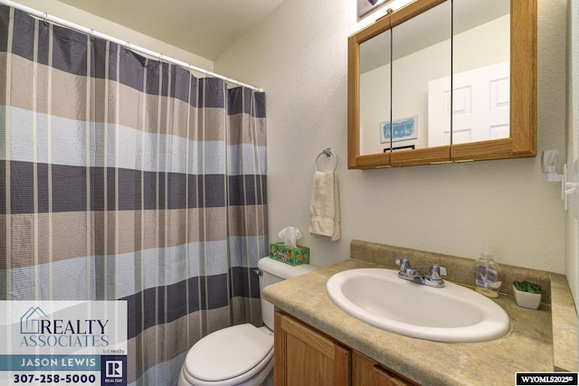 3477 Trappers Trl, Casper, WY 82604 - full bathroom featuring vanity and a textured wall