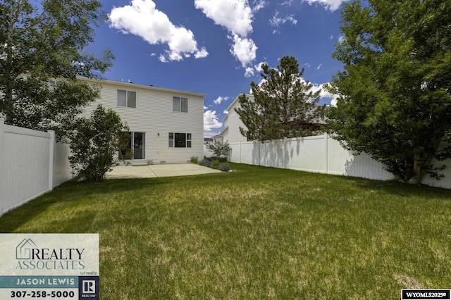 3477 Trappers Trl, Casper, WY 82604 - back of property with a patio area and a fenced backyard