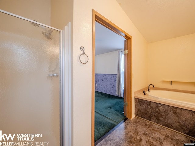 7459 Geary Dome Rd, Evansville, WY 82636 - bathroom featuring a garden tub, a shower stall, and lofted ceiling