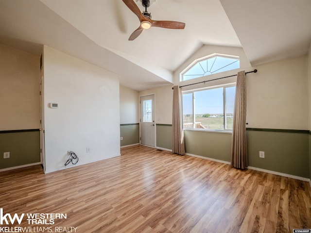 7459 Geary Dome Rd, Evansville, WY 82636 - empty room with lofted ceiling, wood finished floors, and ceiling fan