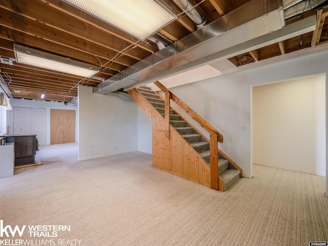 7459 Geary Dome Rd, Evansville, WY 82636 - finished basement with stairs and carpet