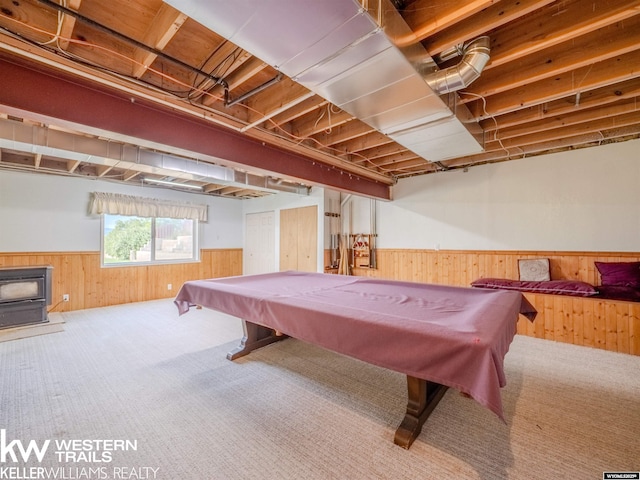 7459 Geary Dome Rd, Evansville, WY 82636 - game room with a wainscoted wall, wooden walls, carpet floors, pool table, and a wood stove