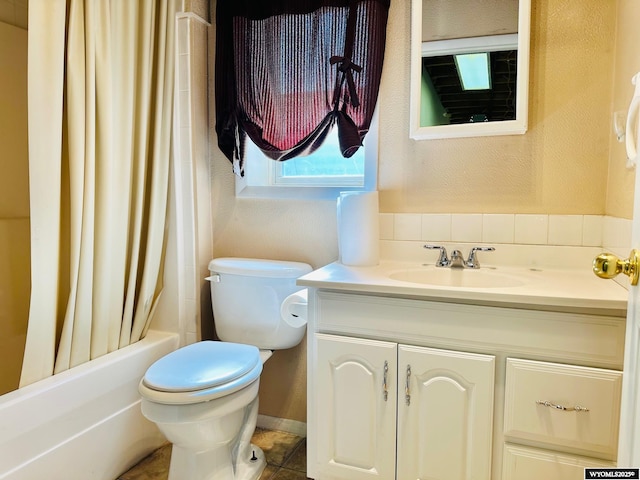 7459 Geary Dome Rd, Evansville, WY 82636 - full bath featuring vanity and shower / tub combo with curtain