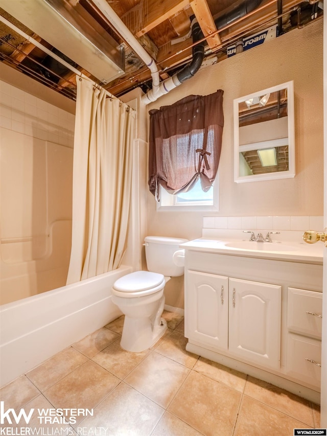 7459 Geary Dome Rd, Evansville, WY 82636 - full bath featuring vanity, shower / bath combo with shower curtain, and tile patterned floors