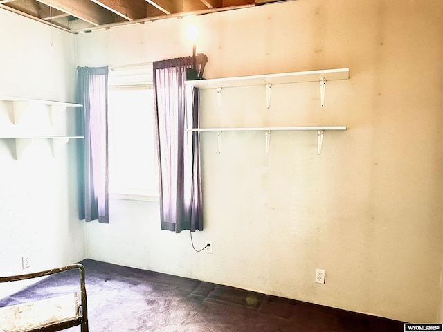 7459 Geary Dome Rd, Evansville, WY 82636 - unfurnished room featuring concrete floors
