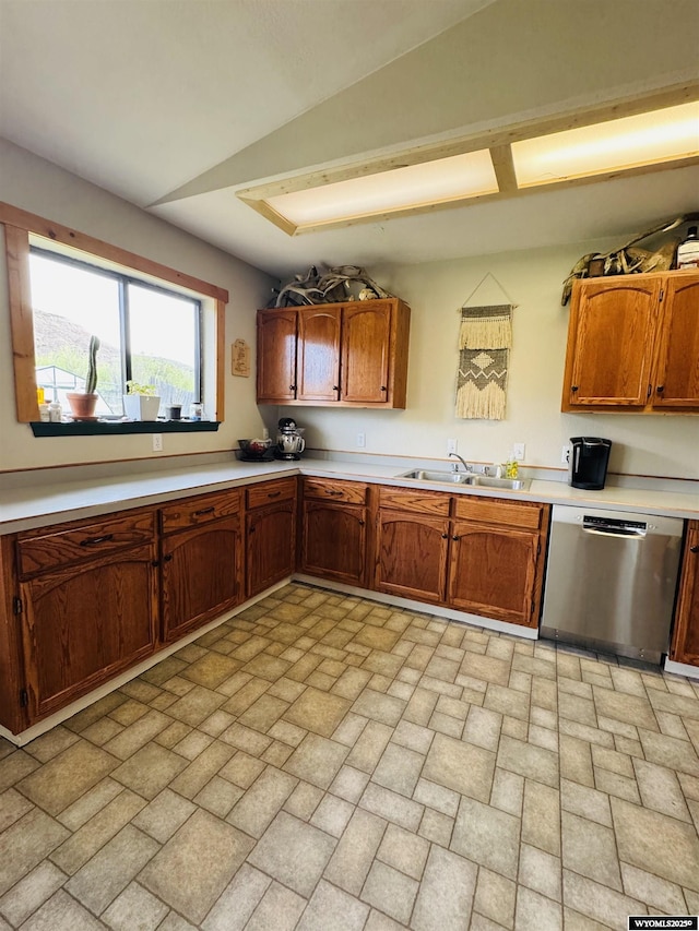 1512 Highview Dr, Dubois, WY 82513 - kitchen featuring stainless steel dishwasher, brick patterned flooring, and light countertops