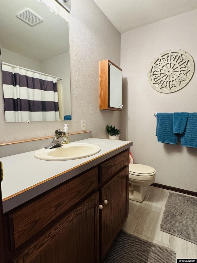 1512 Highview Dr, Dubois, WY 82513 - bathroom with vanity and toilet