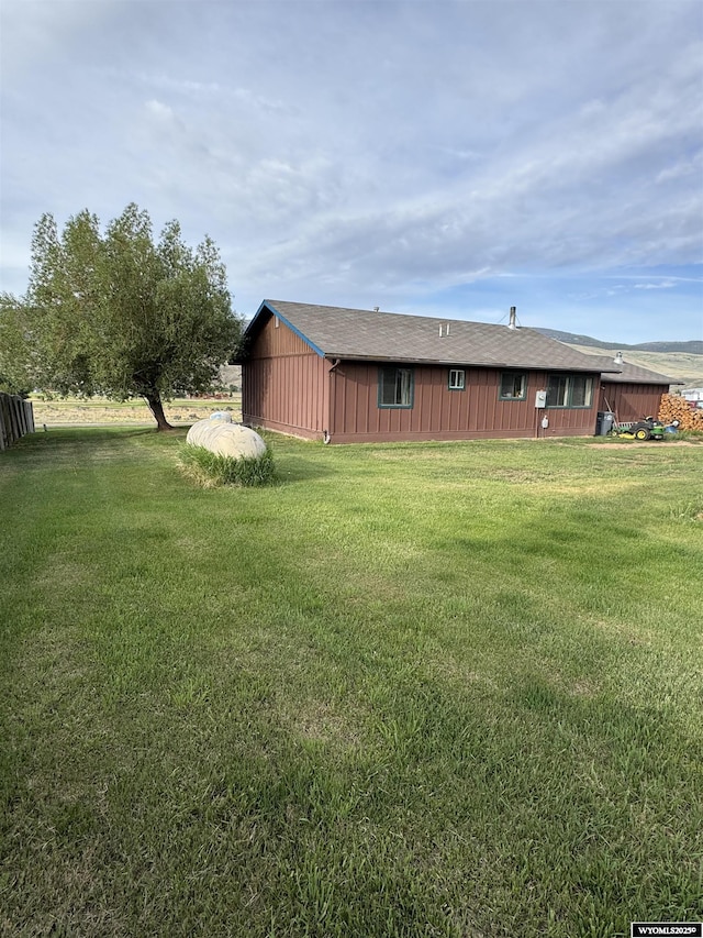 1512 Highview Dr, Dubois, WY 82513 - rear view of property featuring a yard and board and batten siding