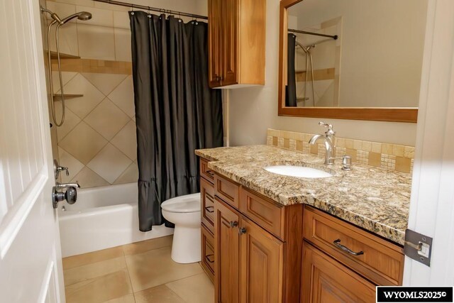 1011 Heritage Cove Dr, Lyman, WY 82937 - bathroom featuring shower / bathtub combination with curtain, vanity, and tile patterned floors