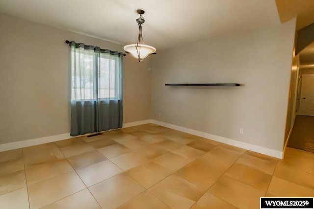 1011 Heritage Cove Dr, Lyman, WY 82937 - tiled spare room with baseboards