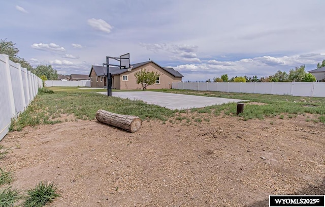 1011 Heritage Cove Dr, Lyman, WY 82937 - fenced backyard featuring basketball court