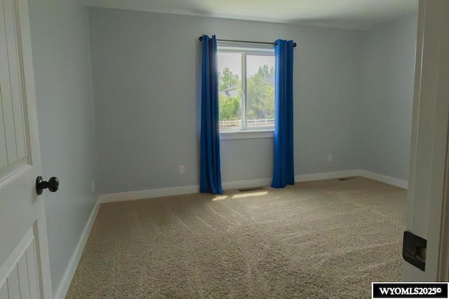 1011 Heritage Cove Dr, Lyman, WY 82937 - carpeted spare room with baseboards