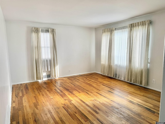 422 Beech Ave, Kemmerer, WY 83101 - spare room featuring hardwood / wood-style flooring and baseboards