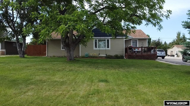 828 Fort St, Buffalo, WY 82834 - view of front of house featuring a wooden deck